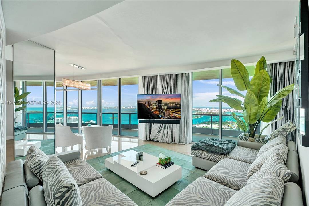 IMPECCABLY DESIGNED AMBIENT STYLE PENTHOUSE WITH BREATHTAKING PANORAMIC BAY amp ; OCEAN VIEWS !