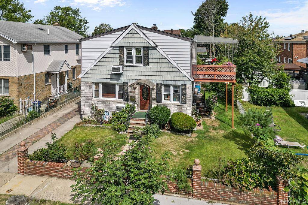 Beautiful 50 x100 lot legal 2 family colonial on a bright and tranquil neighborhood of Bay Terrace.