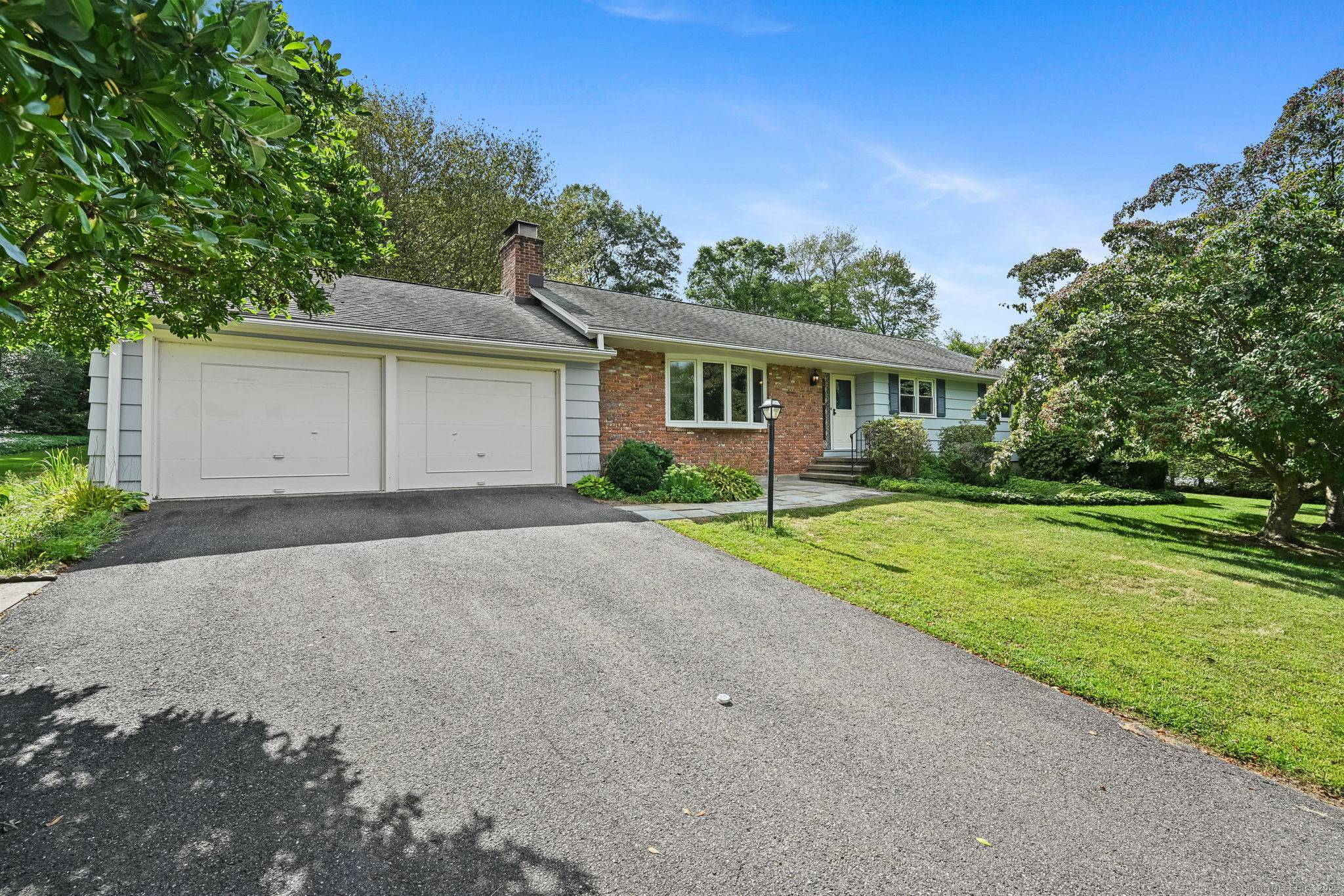 Welcome to 9 W. Wind Rd a charming 3 BR, 2 BTH ranch set on a stunning, park like, 1 AC lot in sought after Trumbull.