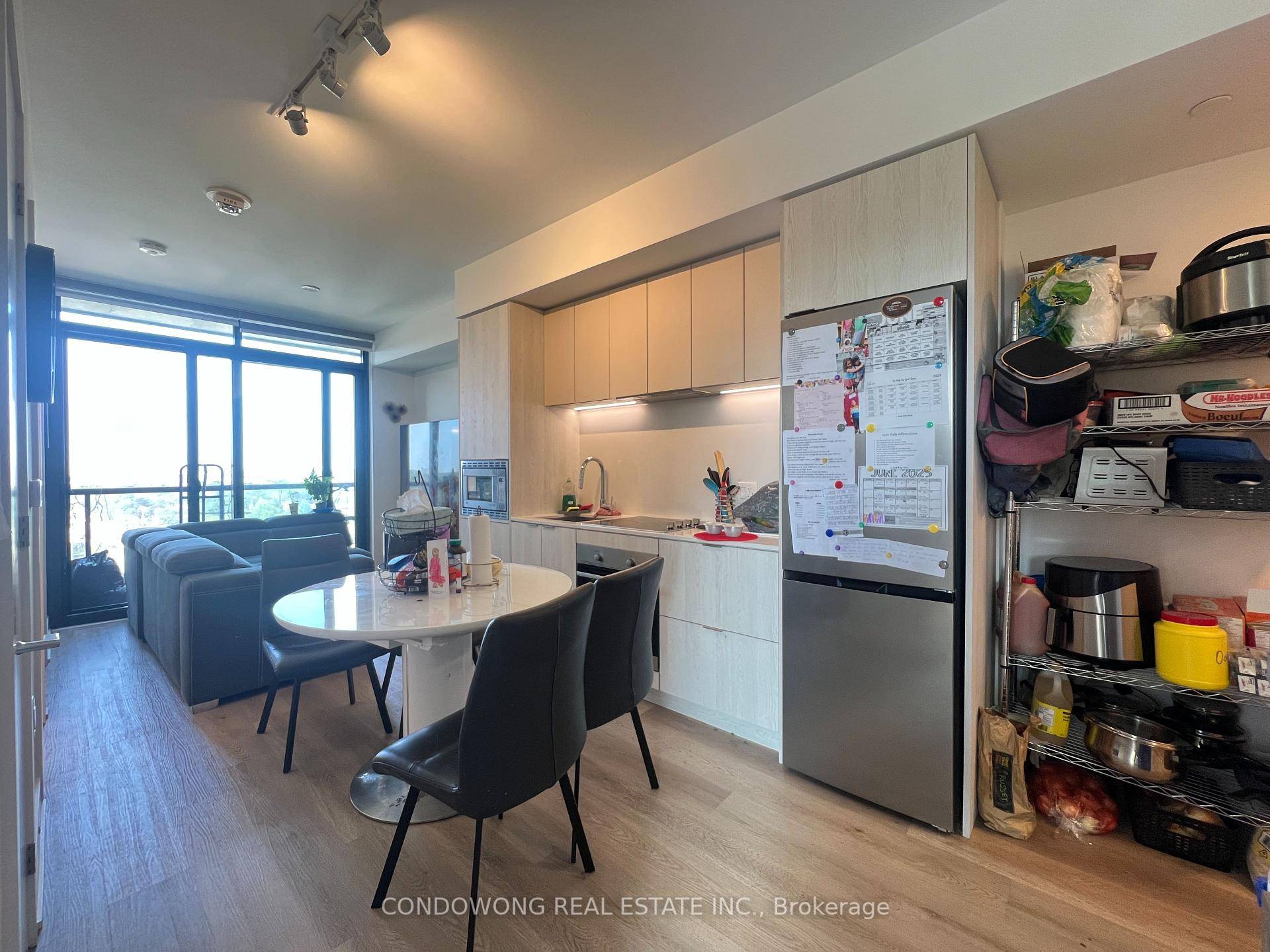 Beautiful Corner Unit, Boasts Modern Lighting, Stainless Steel Appliances, and an abundance of light from almost every room !