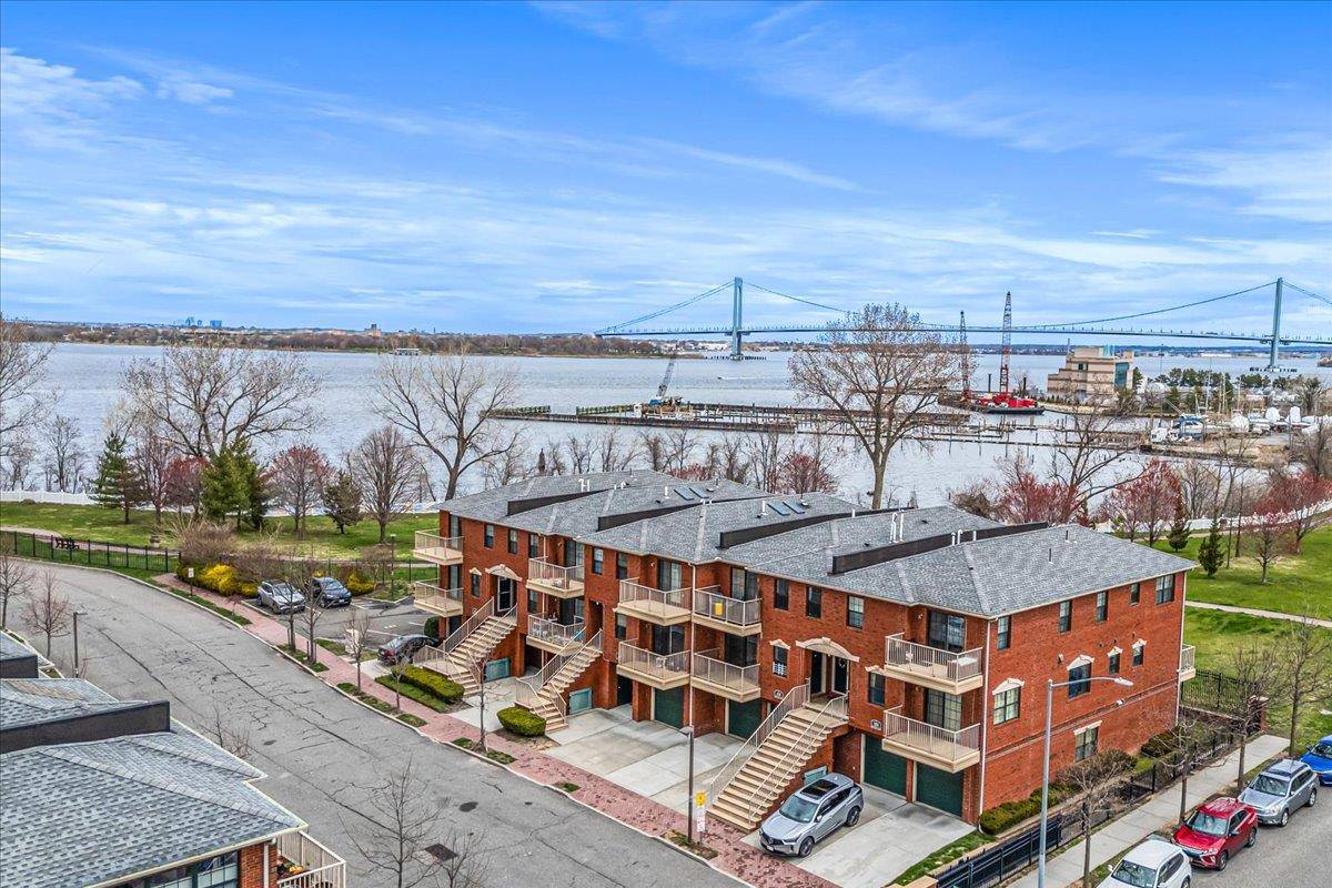 Beautiful updated 4 Br Duplex, Brick Condo W 3 Full Baths.