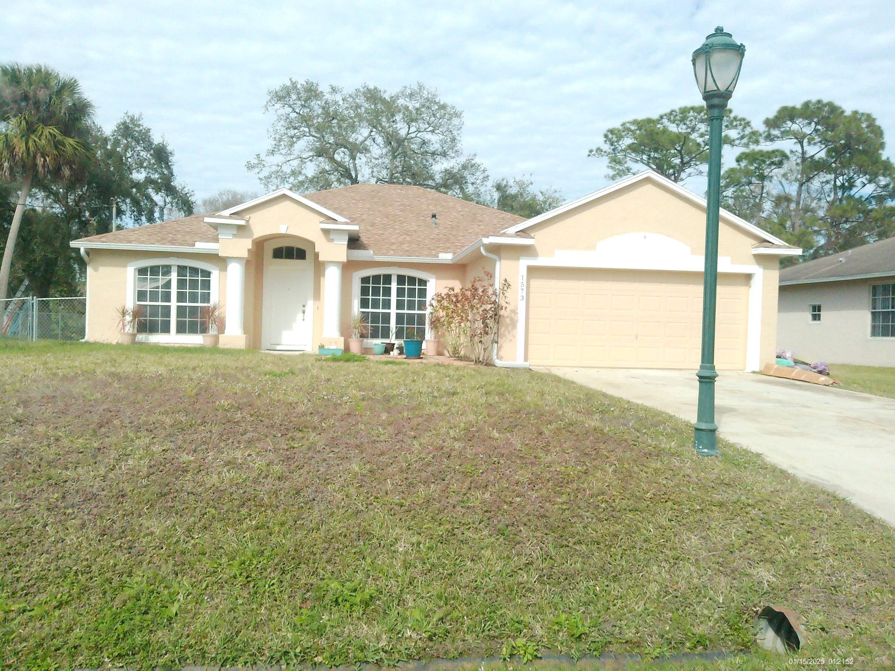 LOVELY 4 BEDROOM 2 BATHS 2 CAR GARAGESINGLE FAMILY HOME IN GREAT LOCATION.
