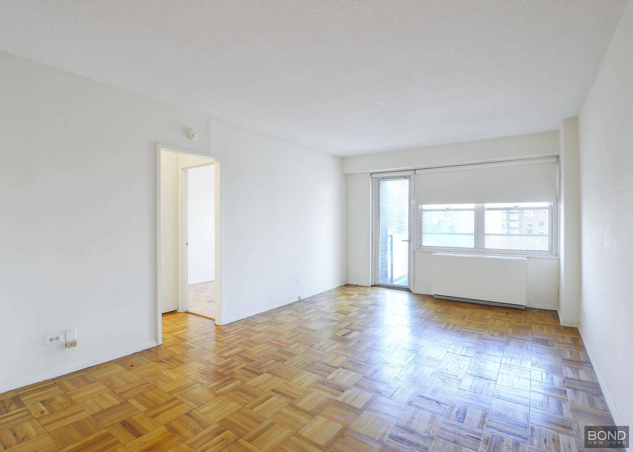 Large and charming one bedroom home in a luxury doorman building that's pet friendly !