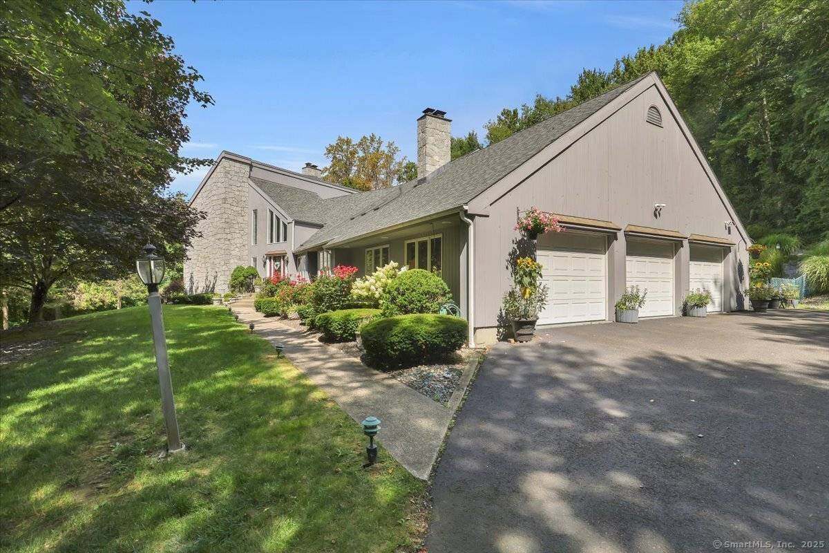 Tucked at the end of a quiet cul de sac on nearly 6 private acres, this expansive contemporary home offers nearly 4, 000 sq ft of above grade living space ...
