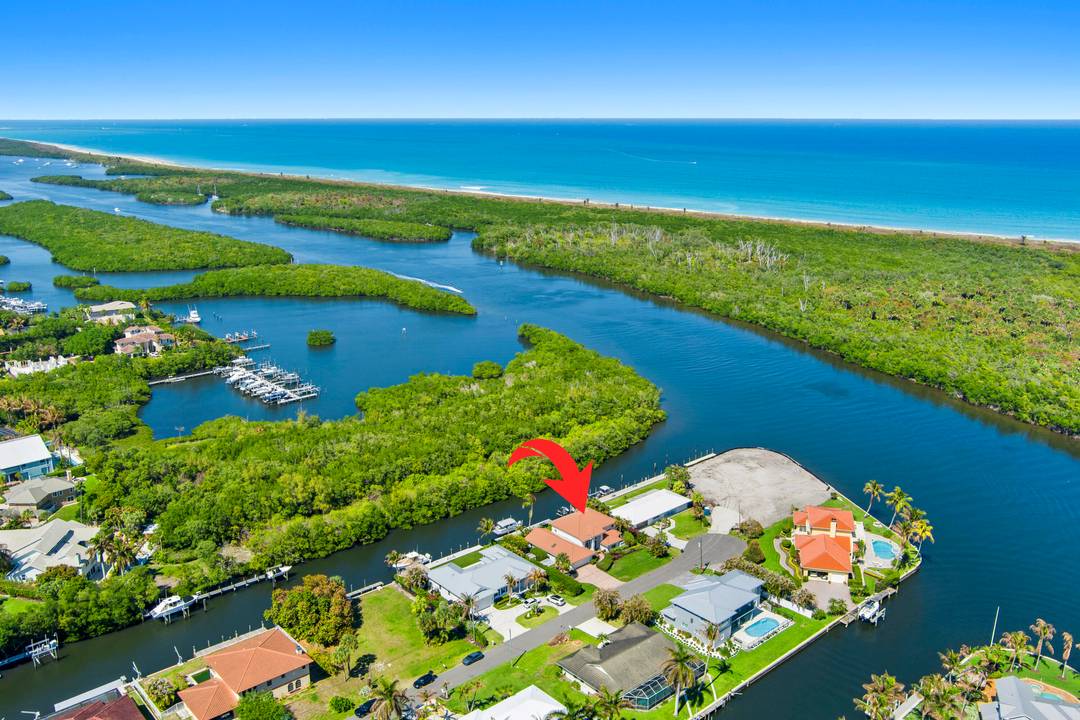 Waterfront living in the heart of Hobe Sound with direct access to the Intracoastal Waterway.