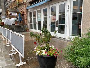 FABULOUS LOCATION with AMAZING OUTDOOR PATIO facing Summer Street with major foot traffic.