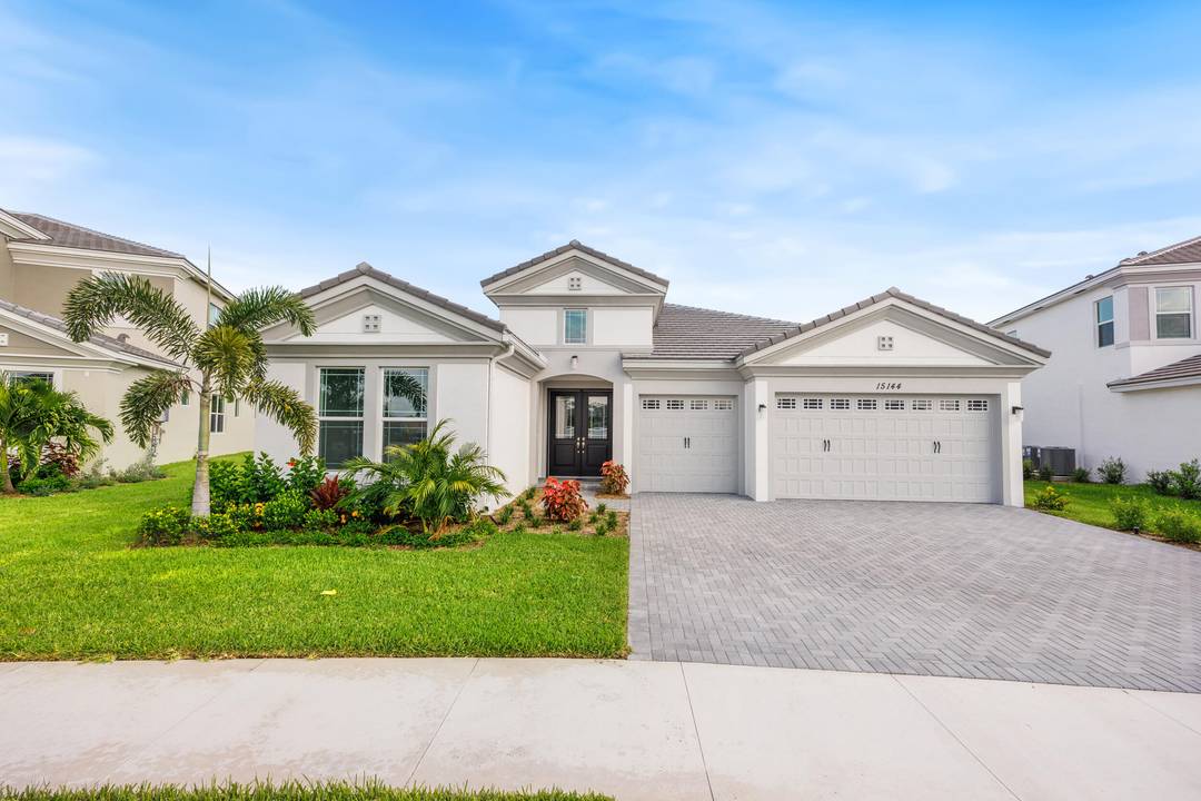 Live the luxury lifestyle in this brand new, never lived in Sanderling model in Westlake, Florida.