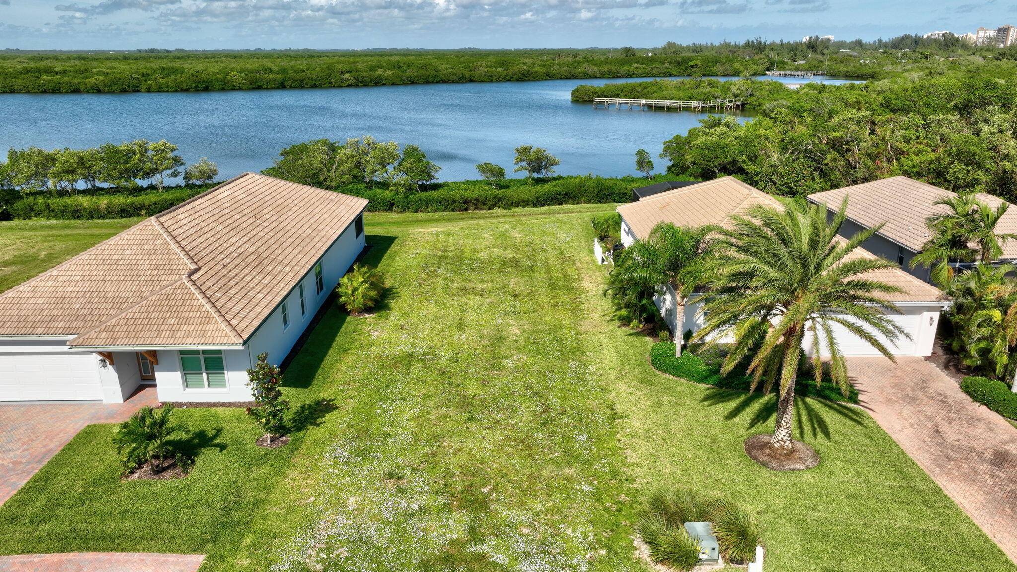 Custom build your riverfront island dream home on North Hutchinson island.