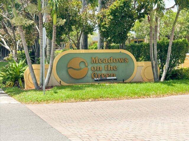Beautifully maintained 2BR 2BA main floor condo in gated community with pool, fitness center, tennis, and clubhouse.
