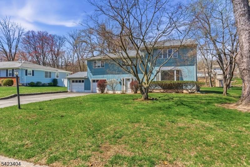 This 4 bed, 2 full and 2 half bath home has been meticulously maintained and is ready for move in or your design updates.