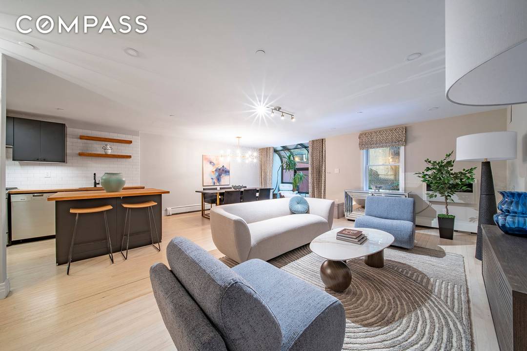 Beautiful East Village Duplex with Private Garden Step into this stunning 1, 383 sq.