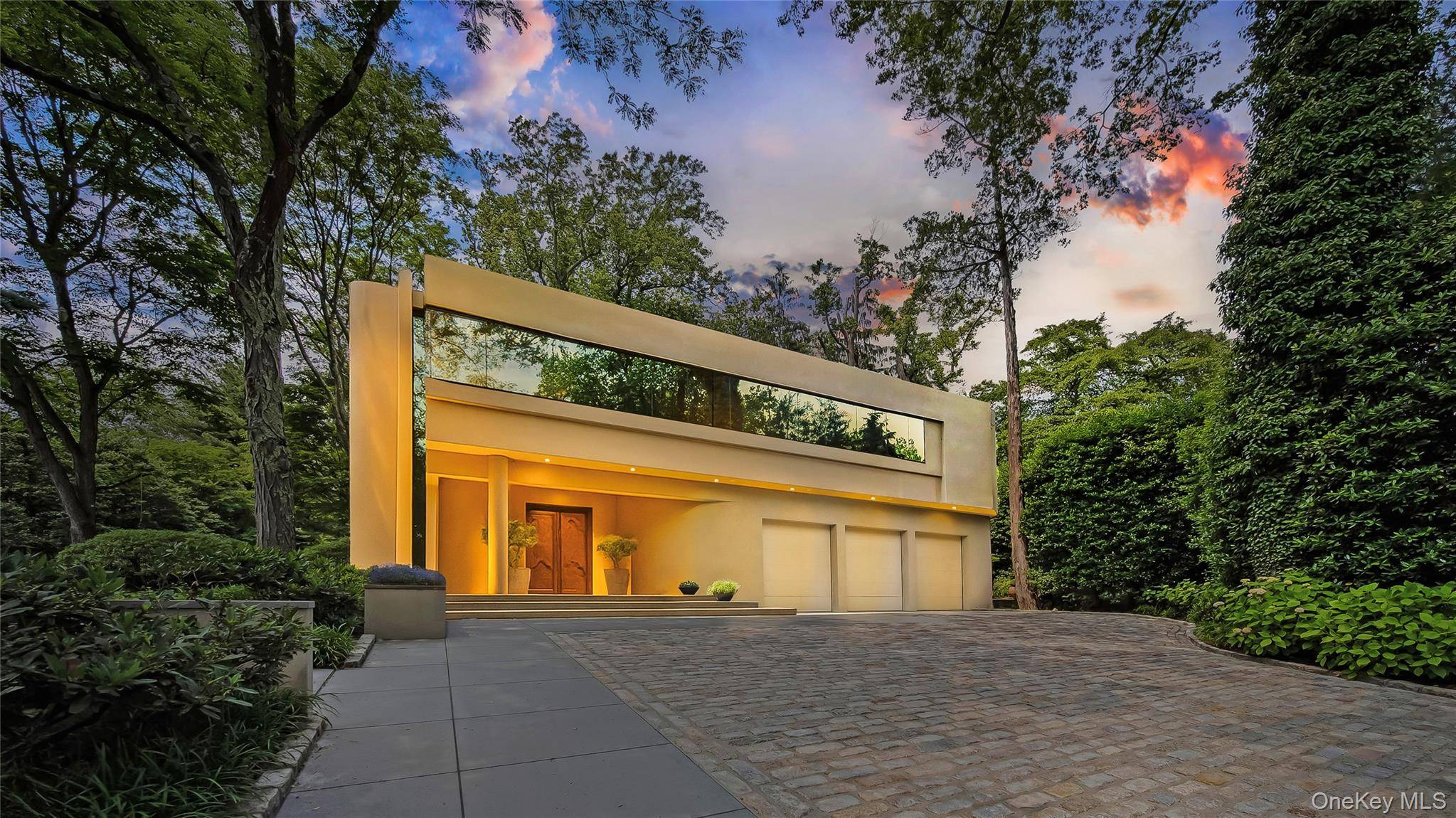Welcome to a sanctuary in North Hills a one of a kind Frank Lloyd Wright inspired contemporary masterpiece, creating a living space that feels both timeless and inviting.