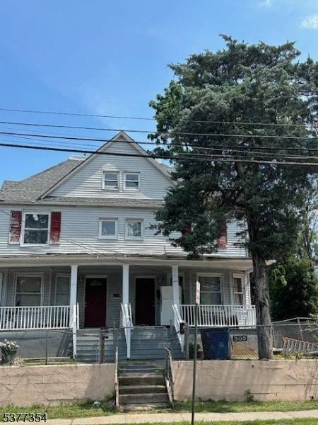 Large 2 family corner property with great potential.