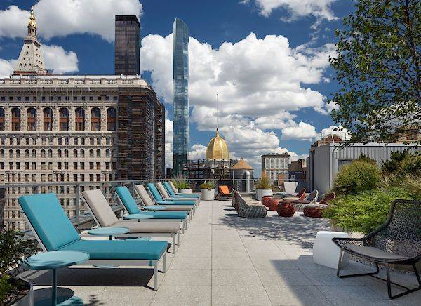 This spacious Studio features floor to ceiling windows, a gourmet kitchen with stainless steel appliances and quartz countertops, an over sized bathroom with a floating vanity, and a walk in ...