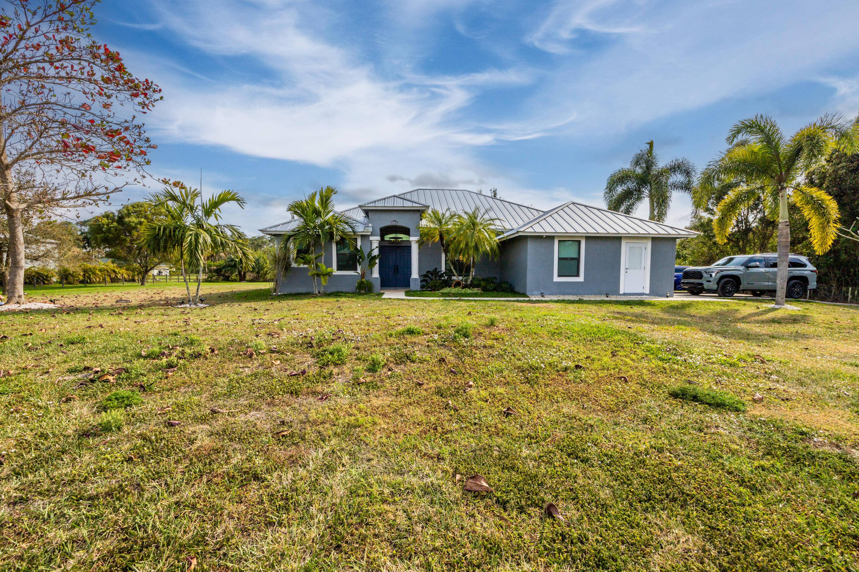This stunning 4 bedroom, 2 bathroom home has been thoughtfully renovated to offer security, comfort, and style.