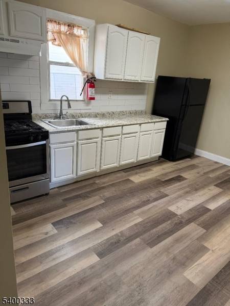 Beautifully maintained and move in ready, this spacious 2 family home offers a fantastic opportunity for both homeowners and investors.