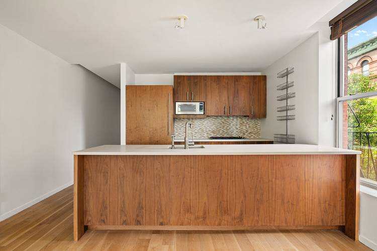 Welcome to Apartment 3B at One Strivers' Row a 1, 244 square foot two bedroom, two bathroom condominium in Central Harlem.