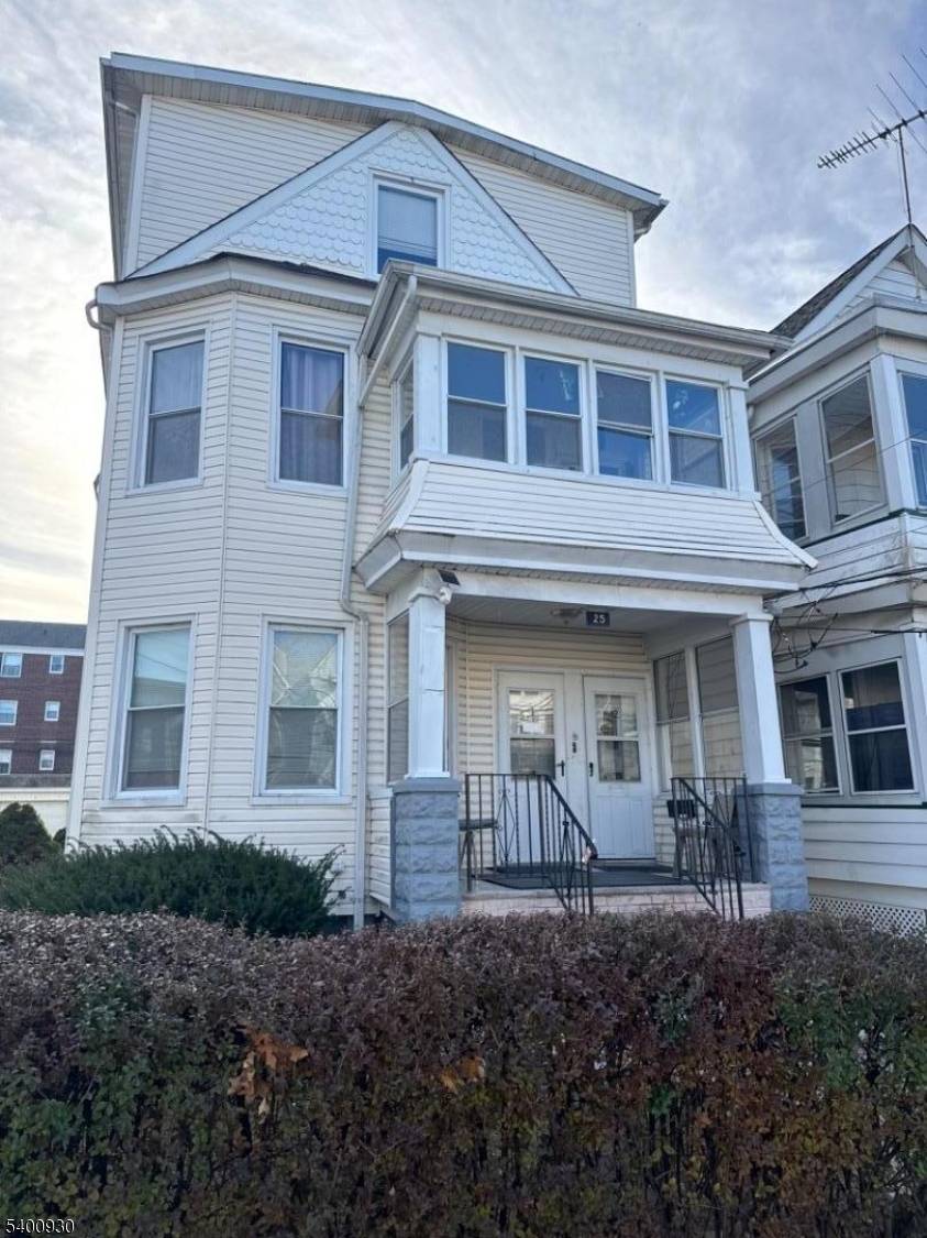 25 Burgess Place, an oversized two family.