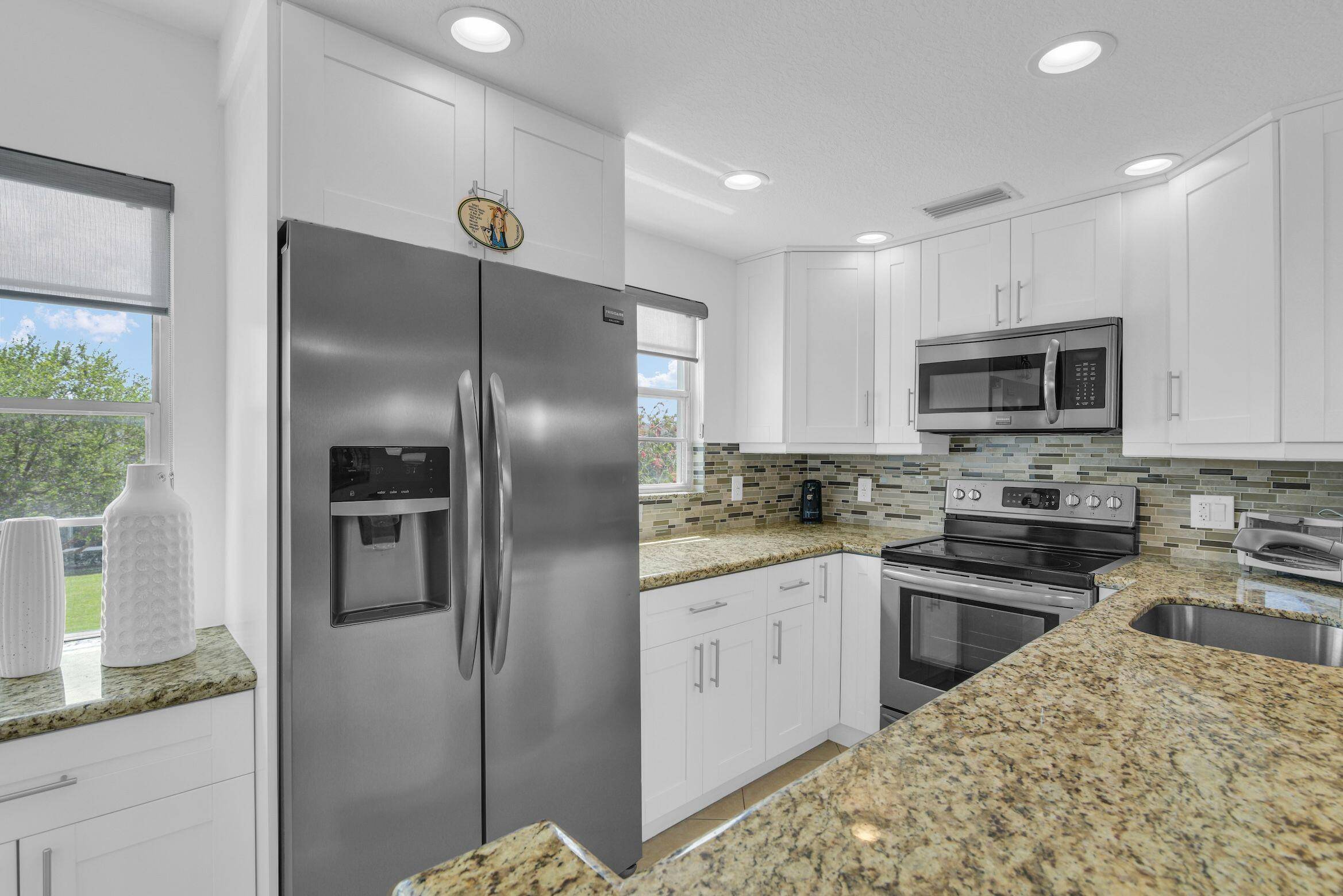 Spectacular corner offers a spacious 2 bedroom, 1.
