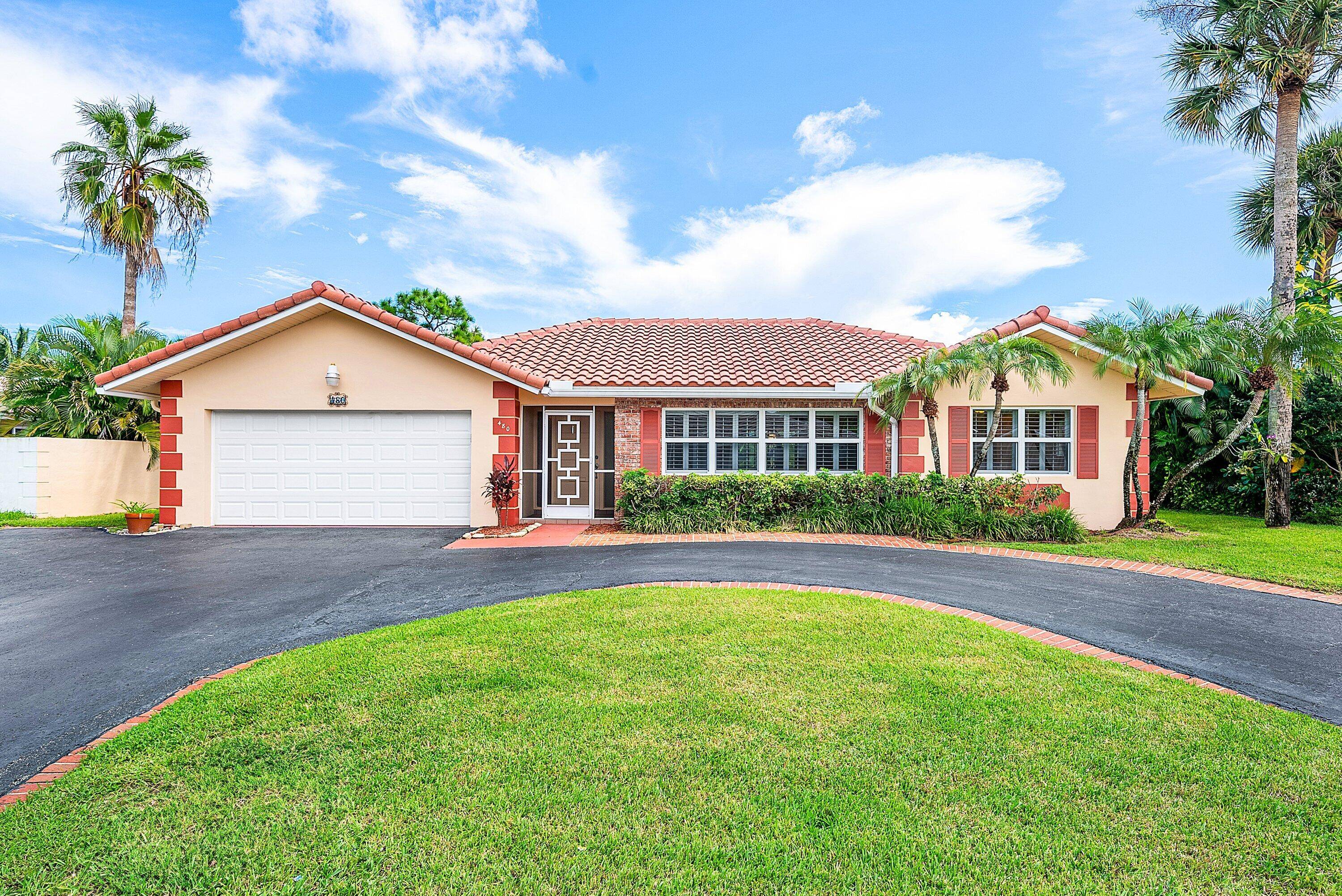 Rare 5 bedroom home in one of East Boca's most charming neighborhoods !