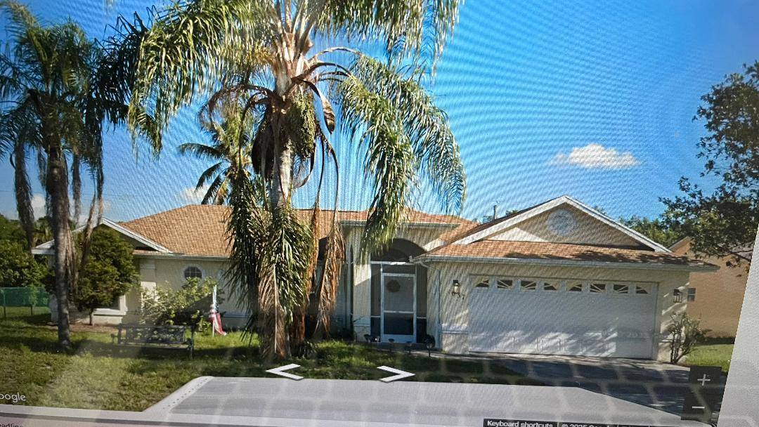 3 2 2 CBS House with lots of potential, needing some TLC and upgrades.