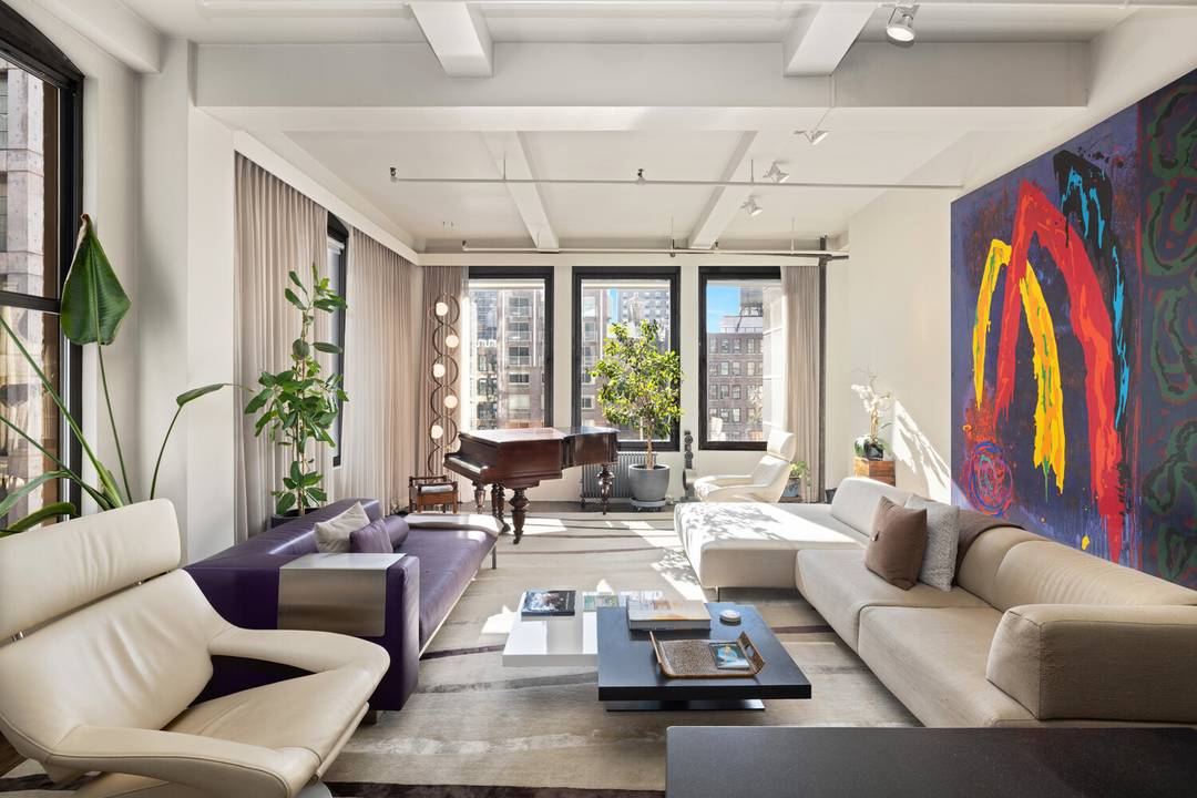 Move right into this sun drenched, sophisticated live work loft, offered fully furnished and sold as seen.