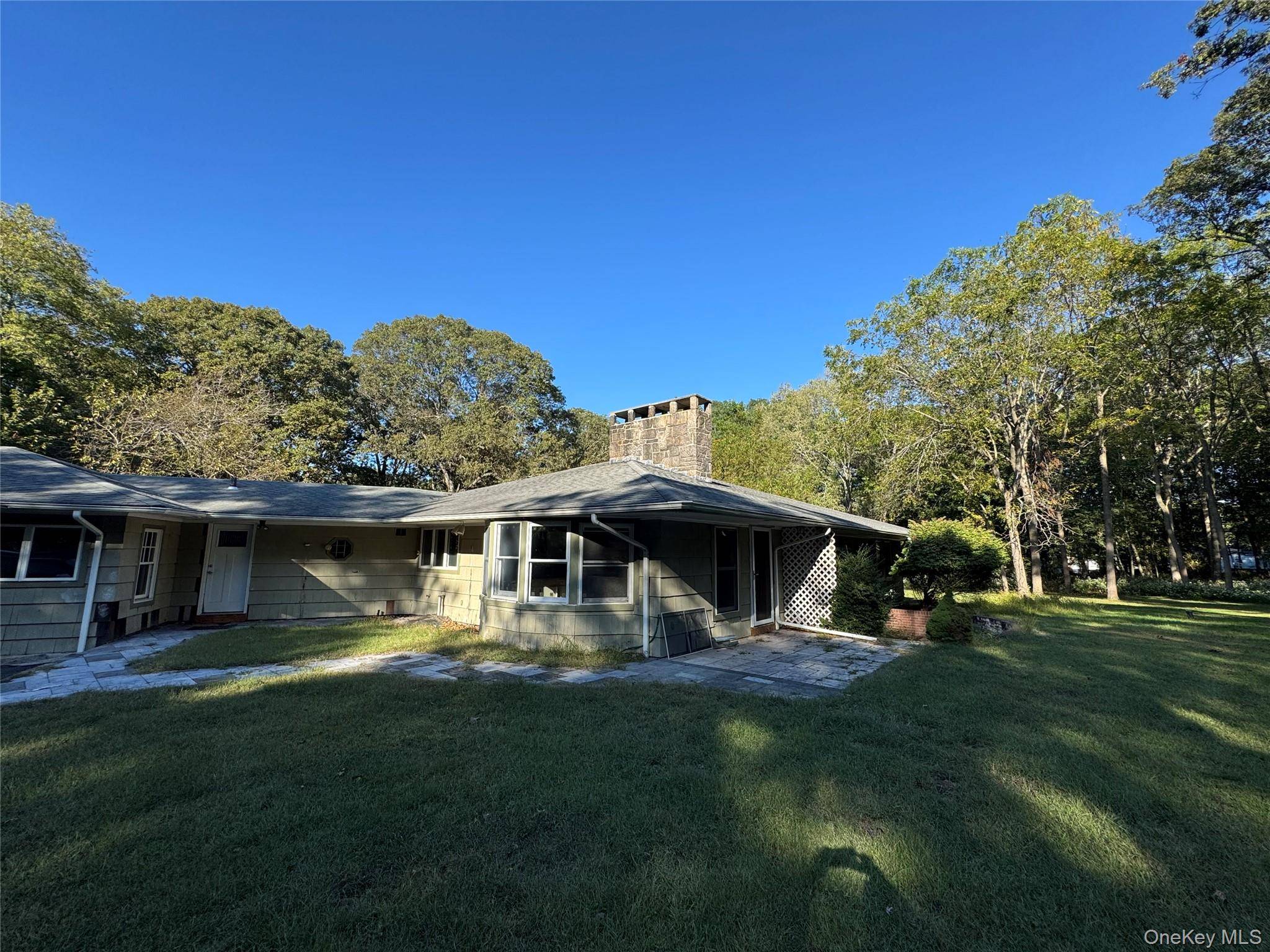 Expanded Ranch with 4 bedrooms, 2 full bathrooms, laundry room, 2x fireplaces, full basement, 2 car garage, on approx 3 acres
