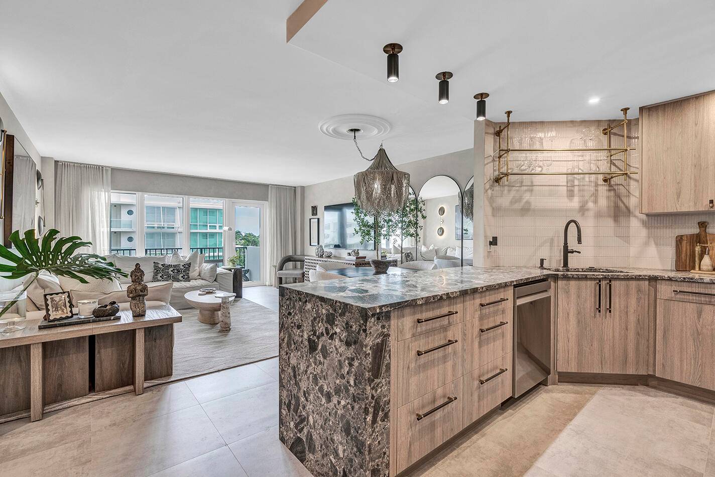 This stunning condo features 2 bedrooms and 2 bathrooms and has been completely reimagined by a celebrity designer, blending high end finishes with effortless style.