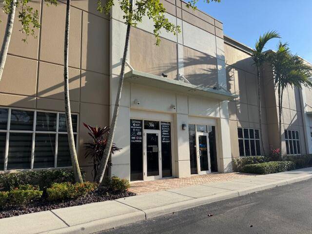 Updated modern unit with tile flooring in the receiving and downstairs conference office areas.