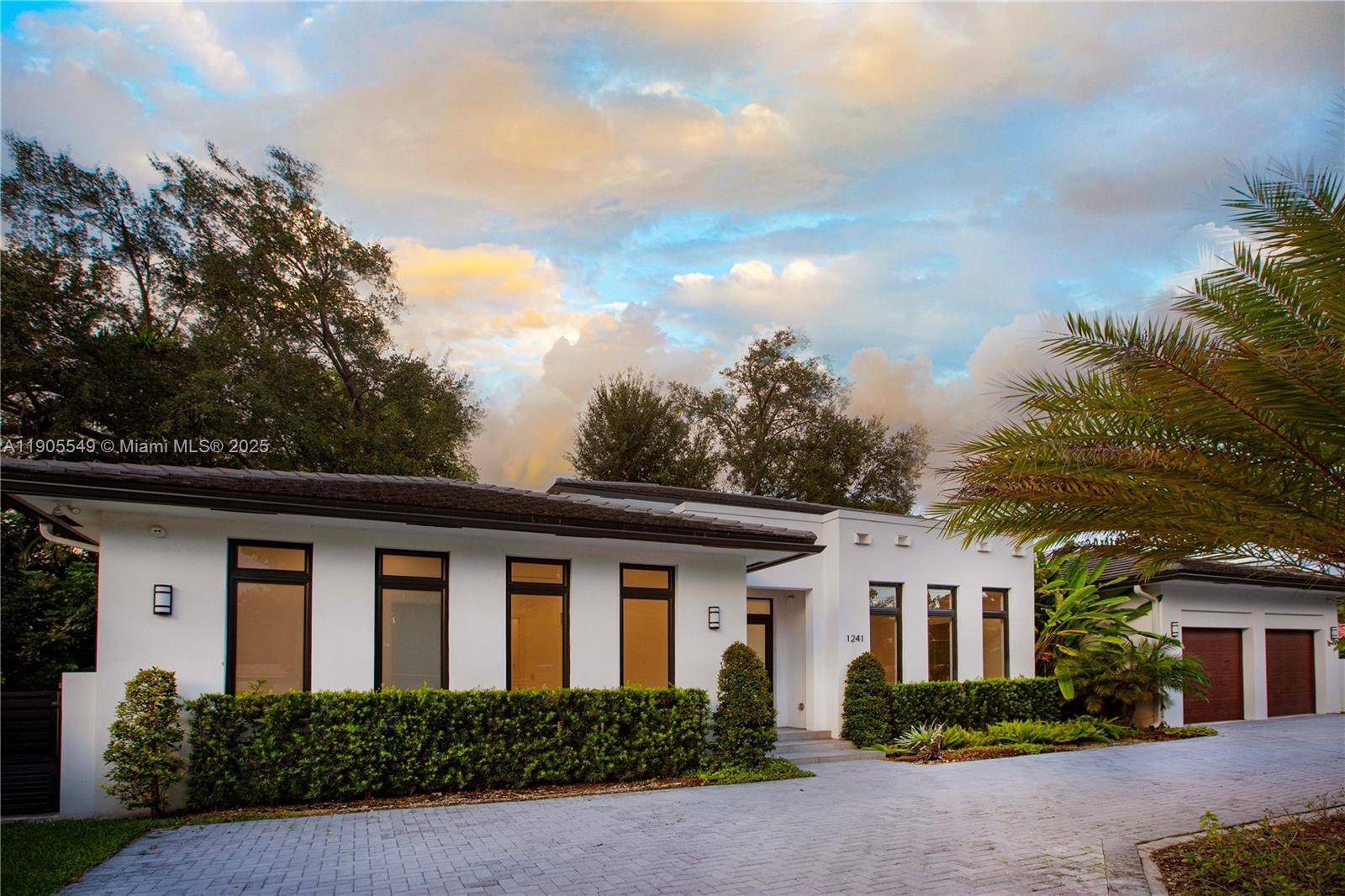 Stately luxury meets modern design in this newly built Coral Gables residence.