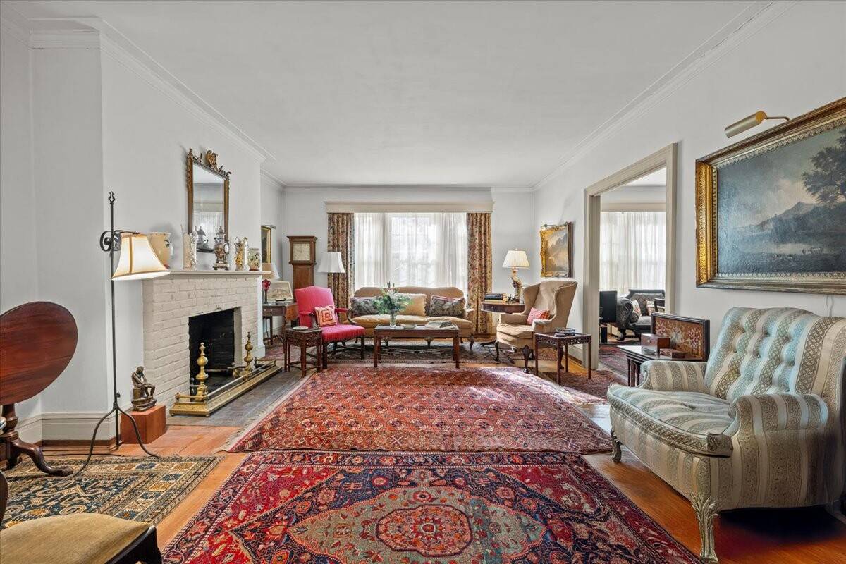 Fieldston Gardens, built in 1926, is a charming Tudor style residence offering a blend of modern convenience and vintage character.