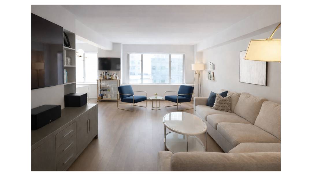 A grand entry foyer introduces this recently renovated, sun filled convertible three bedroom home.