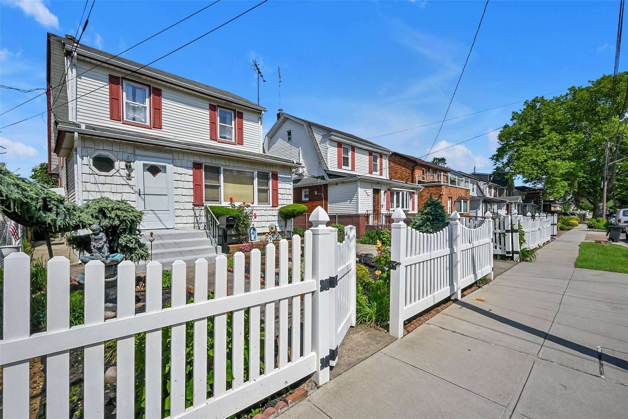 Welcome to this well maintained legal 2 family home located on a quiet residential block in the heart of Queens Village North.