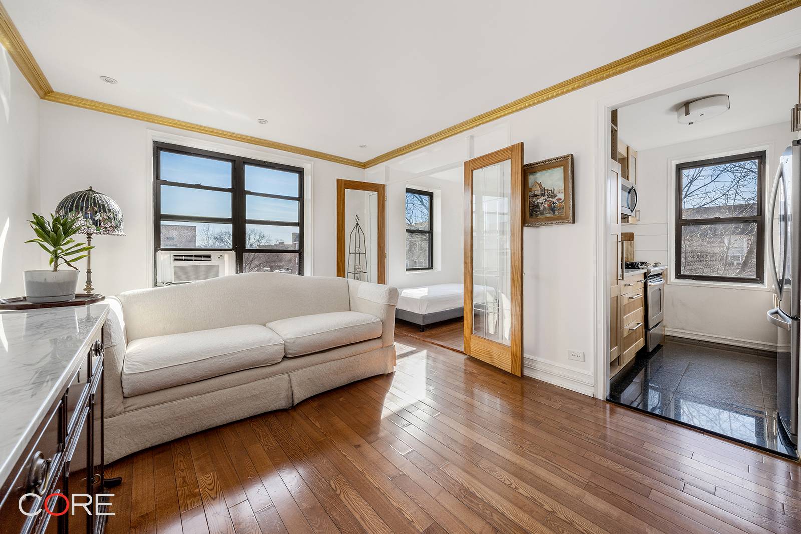 A rare find in Jackson Heights a parking spot with its own share certificate accompanies this top floor Junior 4, offering open views.