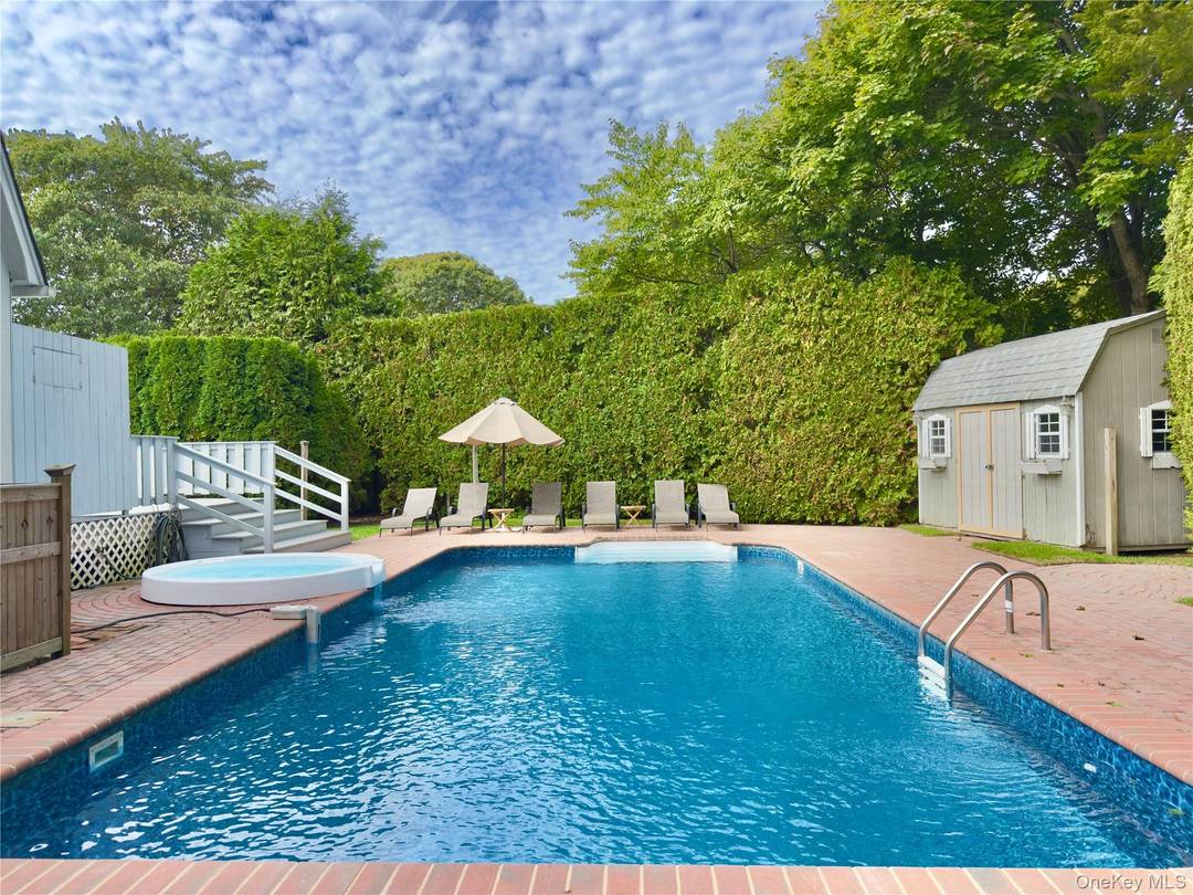 Your Hamptons escape awaits at 18 Alanson Lane in Hampton Bays.