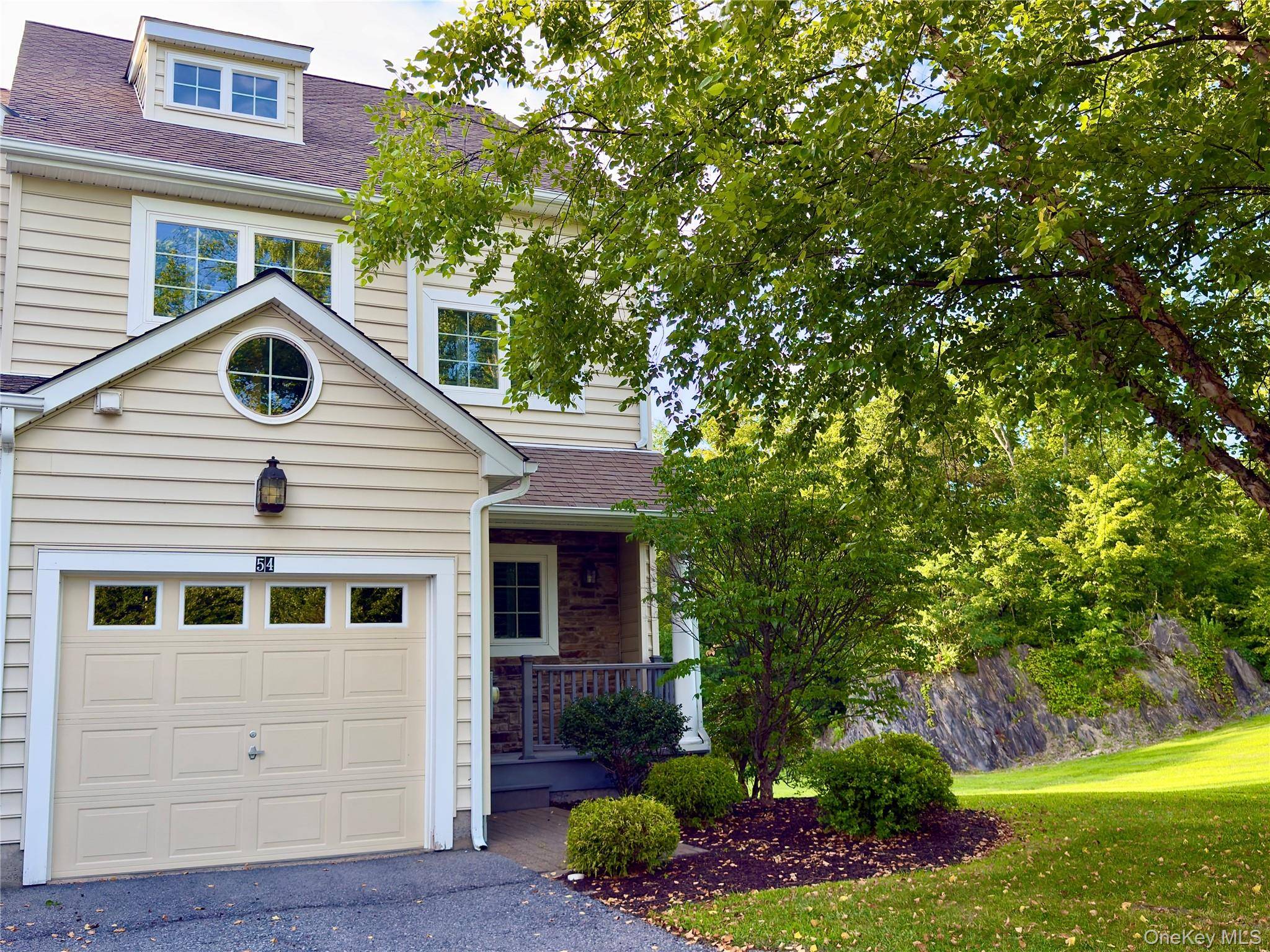 Absolutely stunning three bedroom end unit townhome in the highly sought after River Ridge development, located on the banks of the Hudson River in Hyde Park !