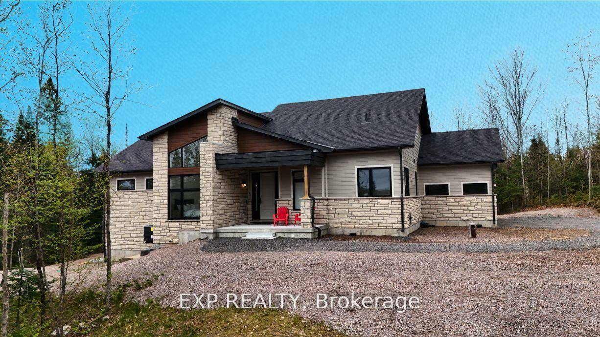 Nestled in the heart of Muskoka's breathtaking new Northern Lights Subdivision, this custom built 2023 bungalow style estate home by Signature Communities perfectly blends modern elegance with natural charm.