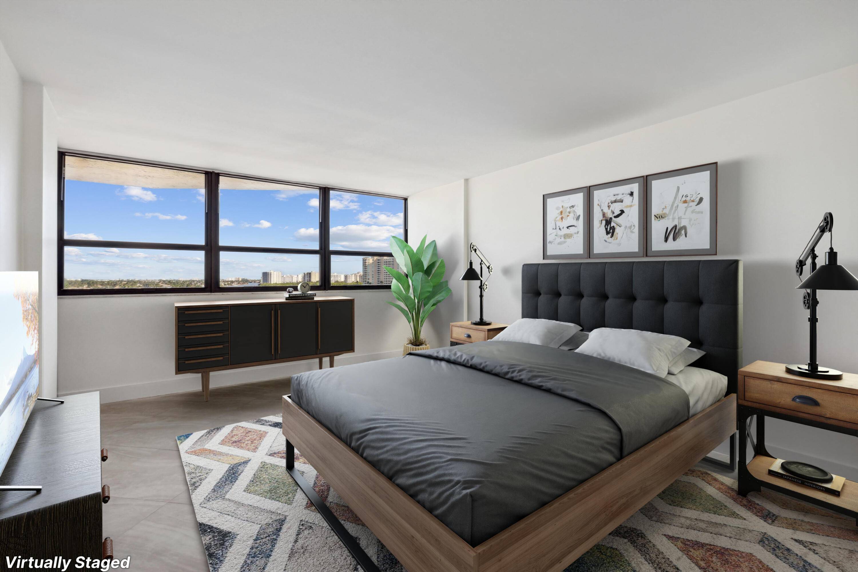 Escape the cold and step into this fully renovated penthouse in Porta Bella of East Boca.