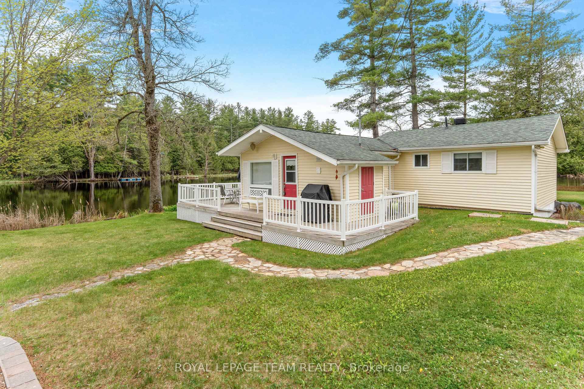 Welcome to 3957 Elphin Maberley Road, a cozy 4 season getaway nestled on a peaceful stretch of the Mississippi River and surrounded by large mature trees !