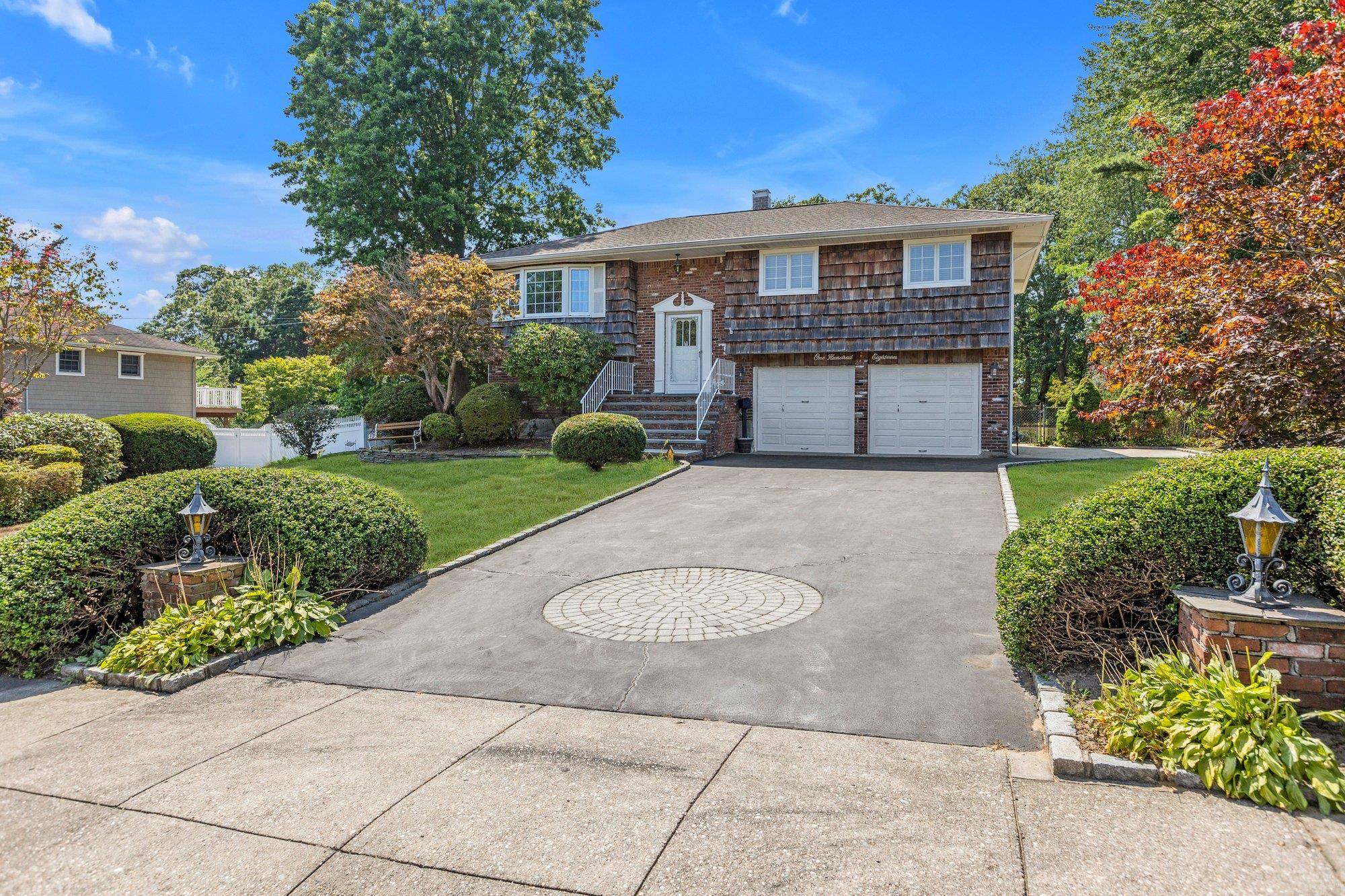 Welcome to 118 Yale Ave, Oakdale NY, 11769 a bright and beautiful Hi Ranch home, where modern convenience meets classic charm.