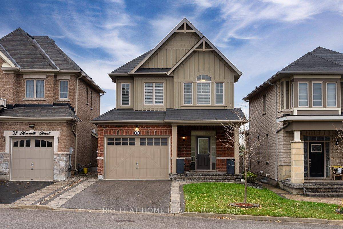 Welcome to this stunning 4 bedroom, 3 bathroom detached brick front home in the prestigious Sharon Village of East Gwillimbury.