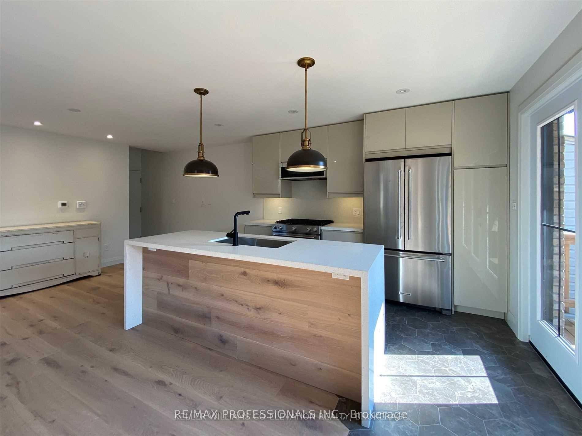 Experience modern urban living in this newly constructed, soundproofed home offering approximately 2, 000 sq.