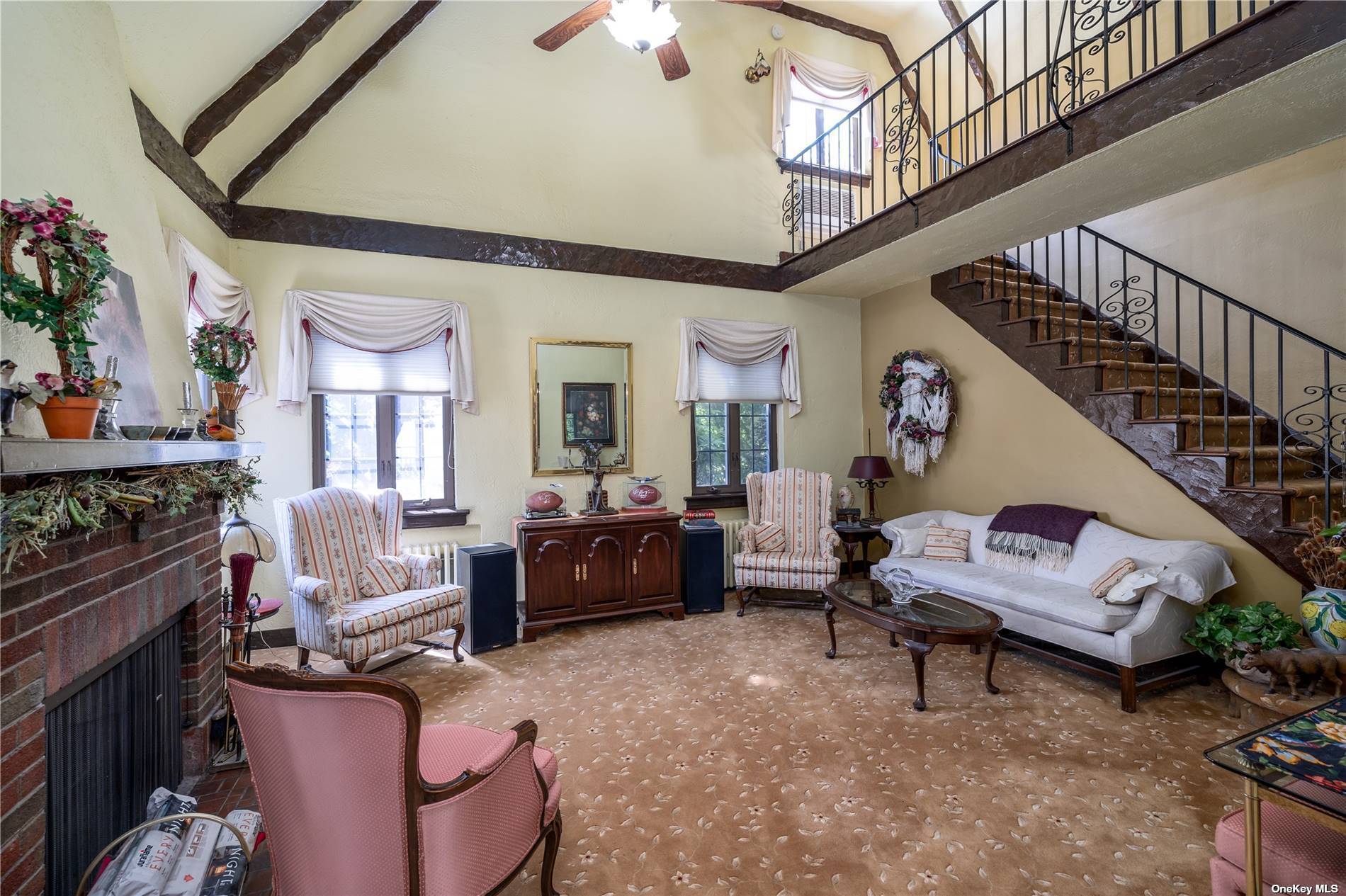 Discover timeless elegance in this charming Tudor home featuring exquisite architectural details.