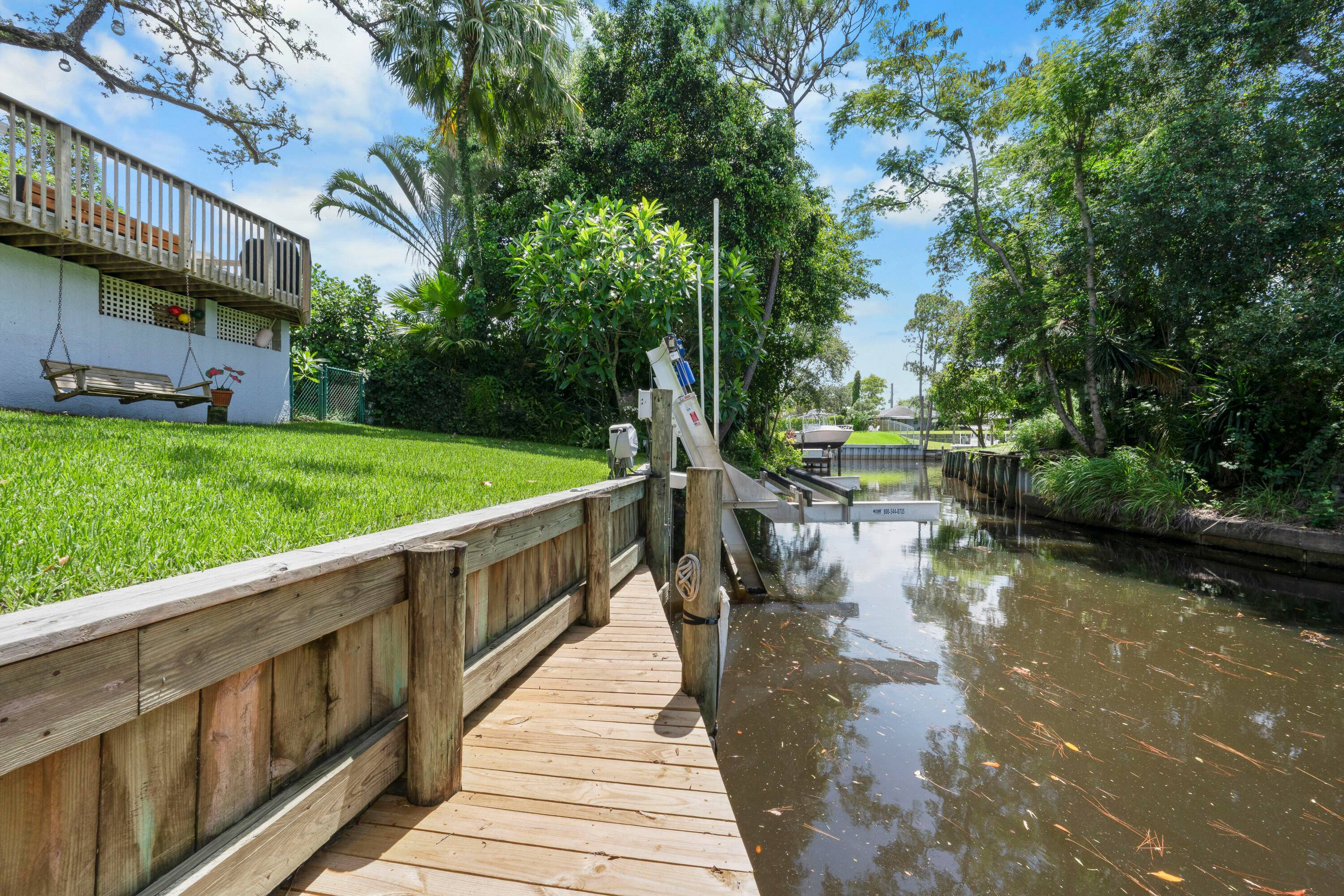 Palm City waterfront home w ocean access in Rustic Hills.