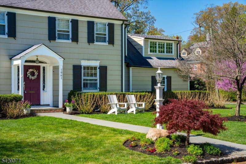Welcome to 1061 Wychwood Road, a beautifully renovated Colonial on a prime corner property in one of Westfield's most coveted neighborhoods adjacent to Echo Lake Country Club.