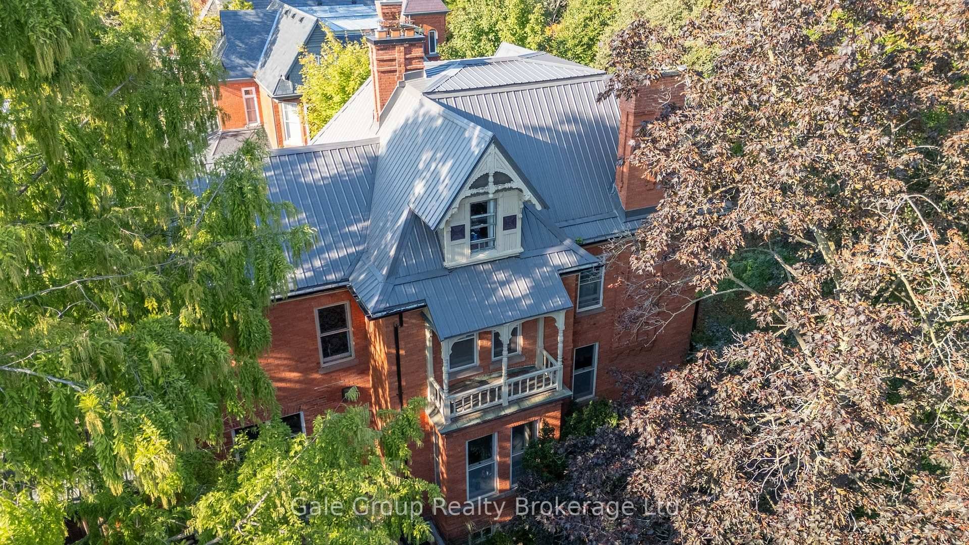A true gem among gems on the most prestigious street in Woodstock, this remarkable century home blends historic charm with modern comfort.