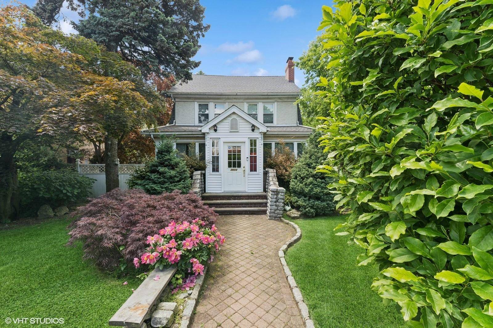 Welcome to this lovely, light filled, impeccably maintained five bedroom, four bath Colonial, gracefully positioned on a beautifully landscaped corner lot and surrounded by lush privacy hedges.