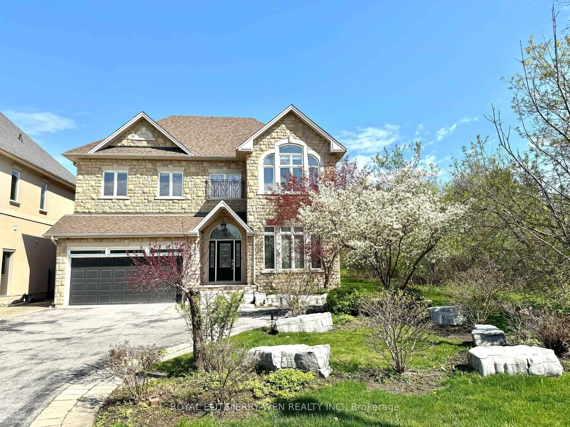 Absolutely breathtaking custom built home on a spacious lot with a backyard oasis.
