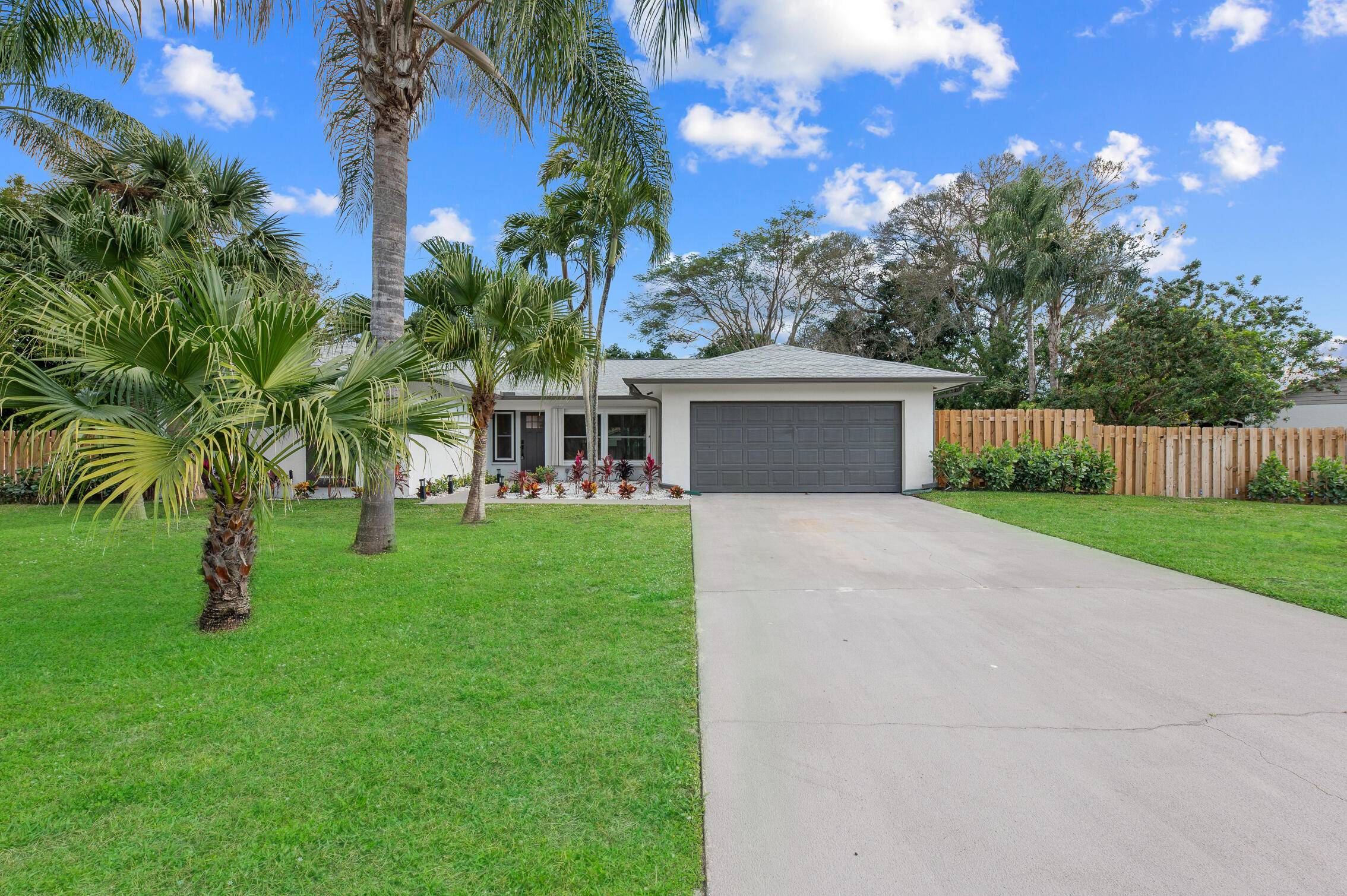 Stunning fully renovated 4 Bedroom home in the heart of Wellington with NO HOA !