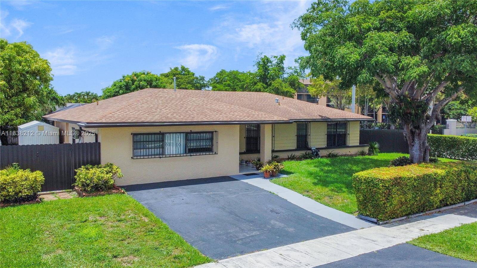 Charming 3 2 corner home with 1, 629 square ft of living space plus a 440 square ft converted garage perfect as a extra room or office.